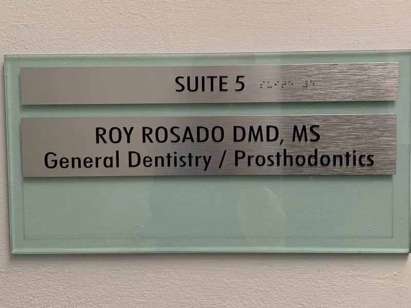 Suite 5 sign reading Roy Rosado DMD, MS — General Dentistry / Prosthodontics